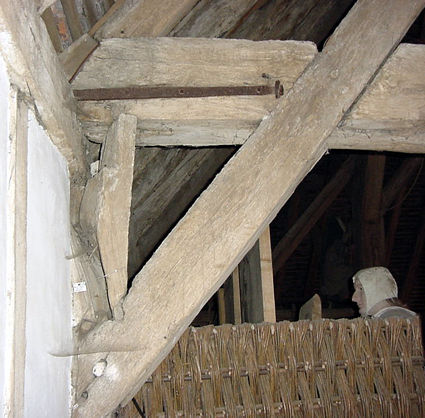 Upstand being slowly ripped out of its joint.