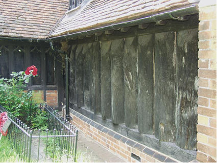 Log wall at Greensted Church