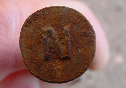 Stamped headed clout nail.