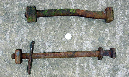 A bolt of 1714 and a railway bolt.